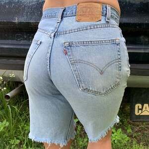 Levi’s destructed cutoff jean shorts fits approx a womens 10